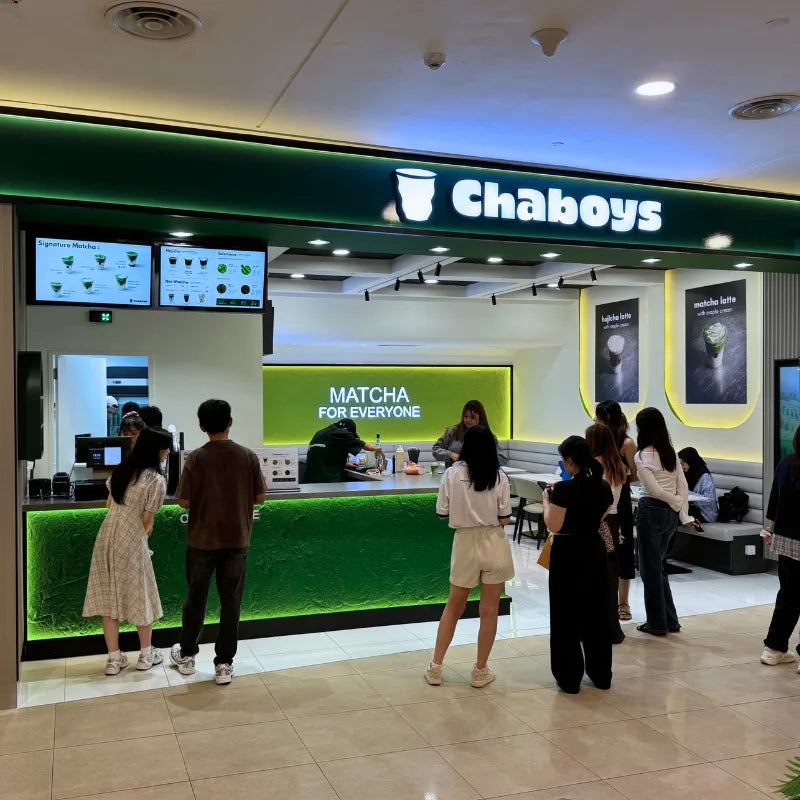 Chaboys kiosk in Sunway Velocity shopping mall, serving matcha and hojicha beverages to a crowd.